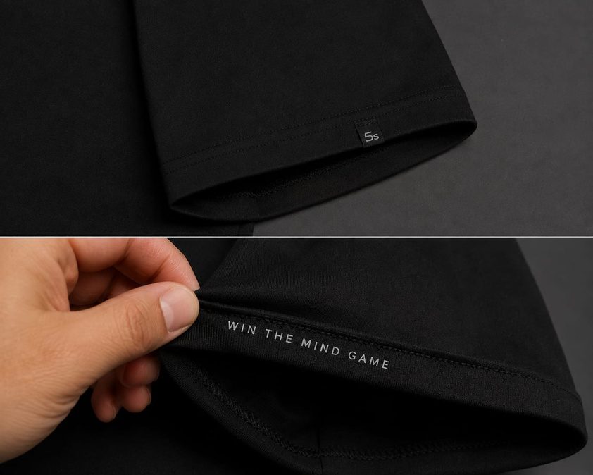 Barra de camiseta preta com a frase Win the mind game aplicada na parte interna